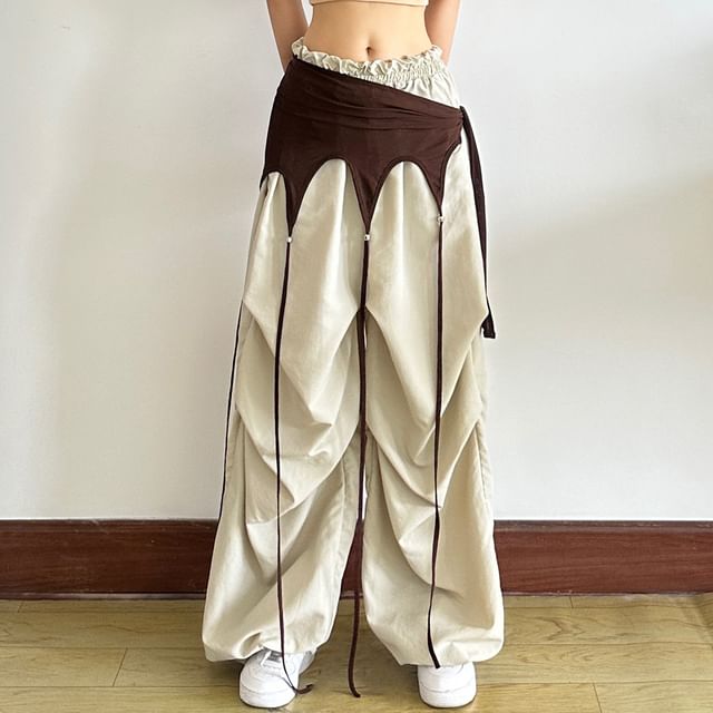 Sugarcoat-Asymmetric Tassel Wrap Skirt
