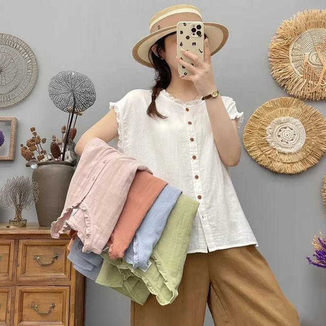 Suzette-Sleeveless Plain Ruffle Blouse
